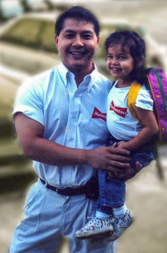 Krisada with daughter, Sumalee (3 yrs old) 1995